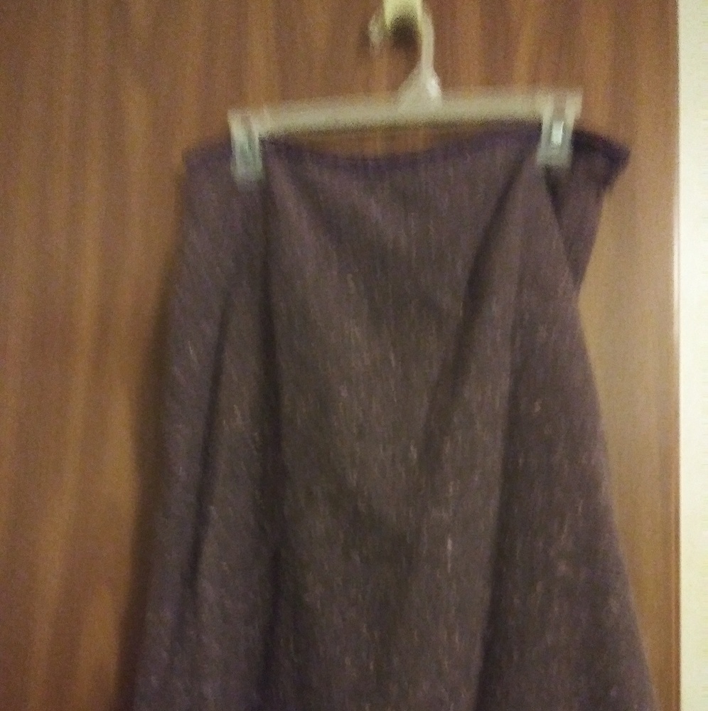 A purple knee high skirt.